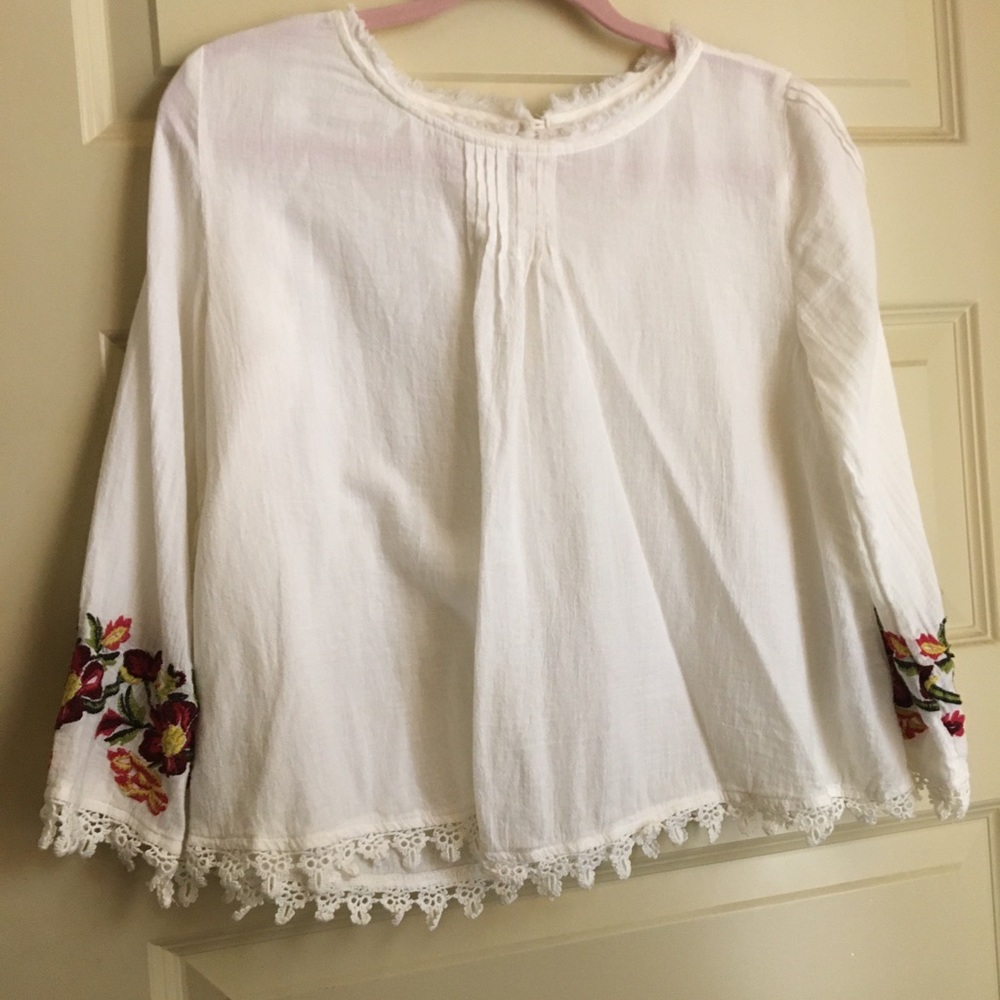 Embroidered sleeve white long sleeve top